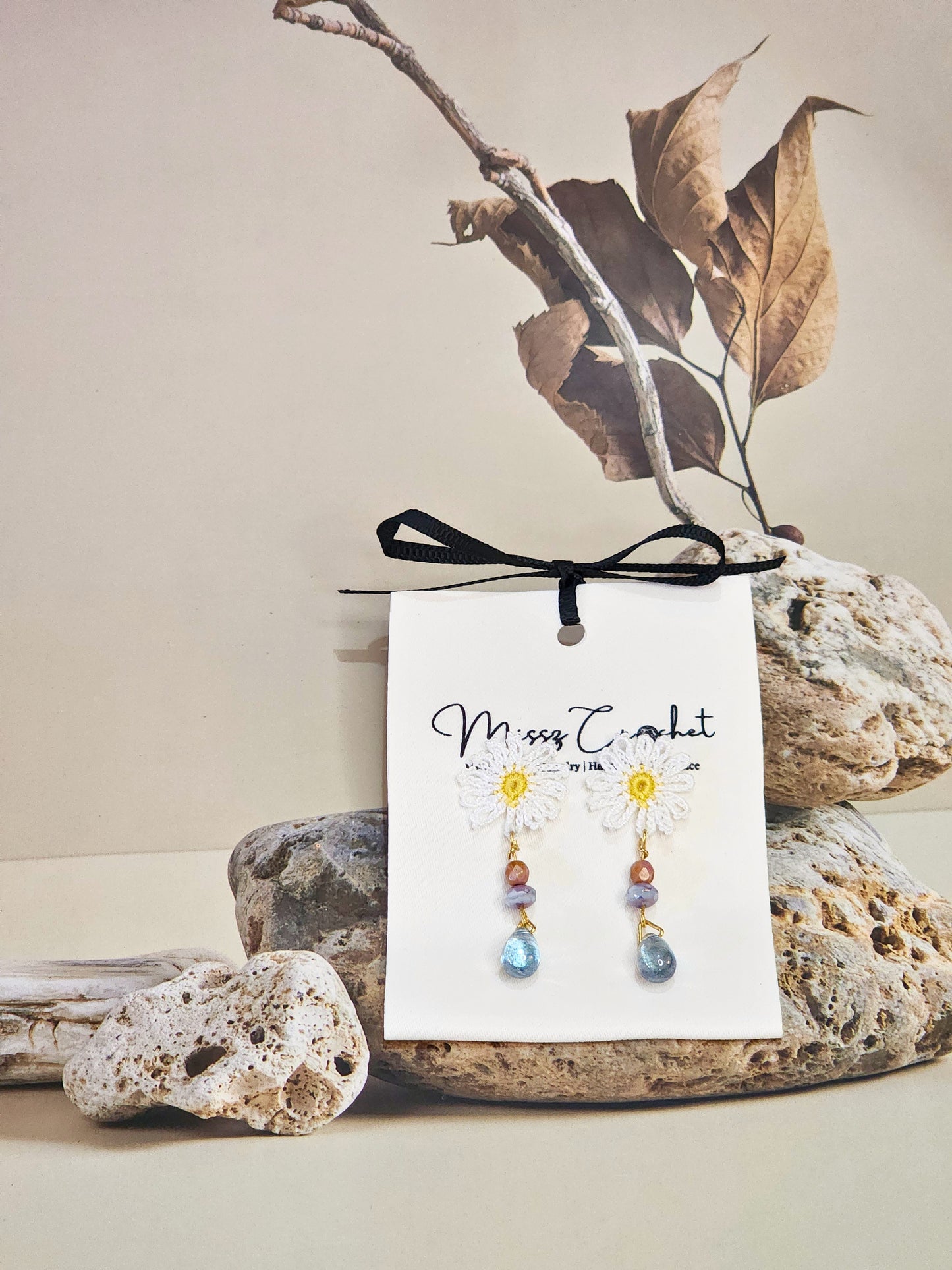 Handcrafted micro-crochet daisies with vintage Czech glass beads. Paired with 18K gold-plated findings & studs.
