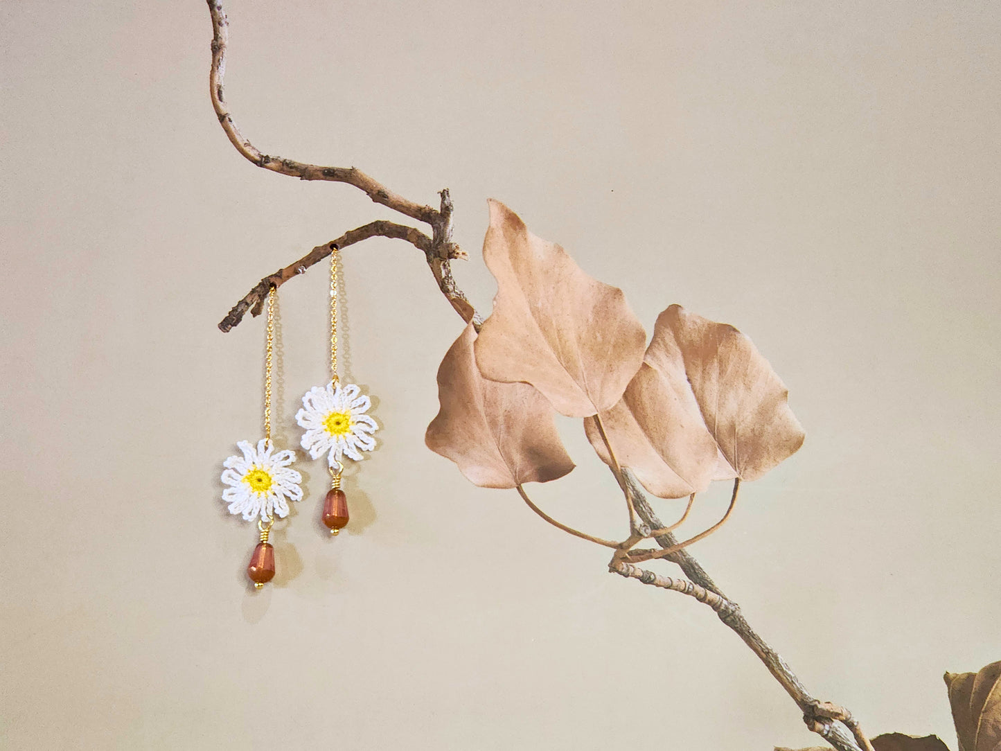 Handcrafted micro-crochet daisies tassel earrings paired with vintage Czech beads. 18K gold-plated tassel hooks.