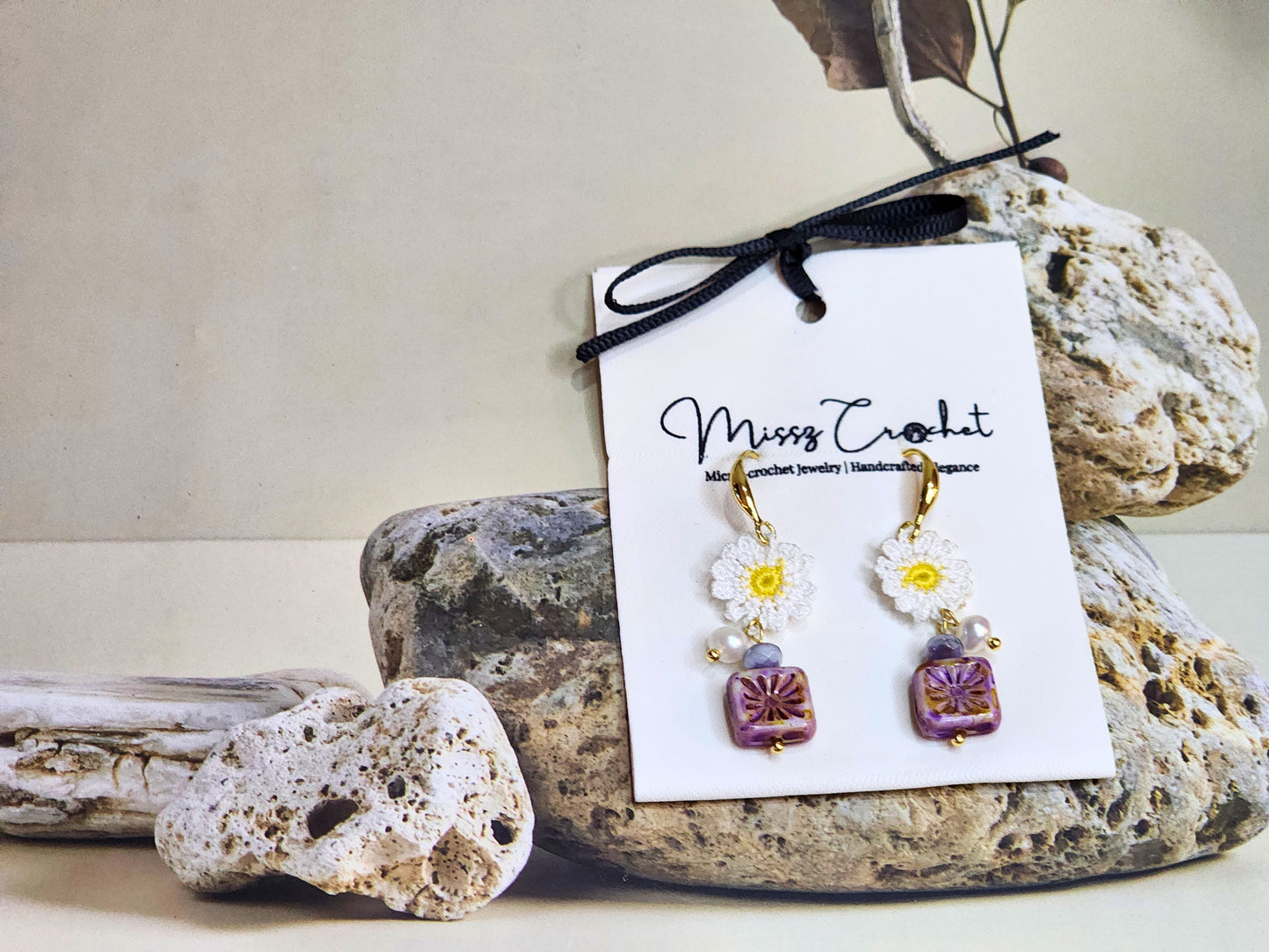 Handcrafted micro-crochet daisies earrings accented with freshwater pearls & vintage Czech glass beads. Styled with 18K gold-plated findings & hooks.