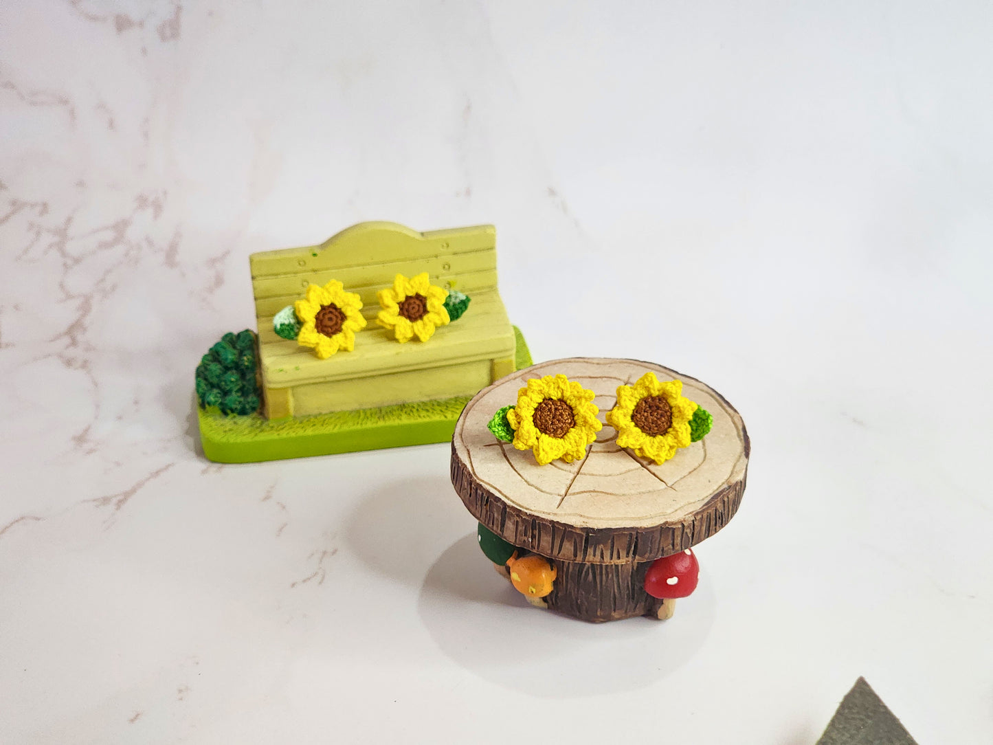 Handcrafted micro-crochet sunflower stud earrings. 18K gold-plated ear studs.