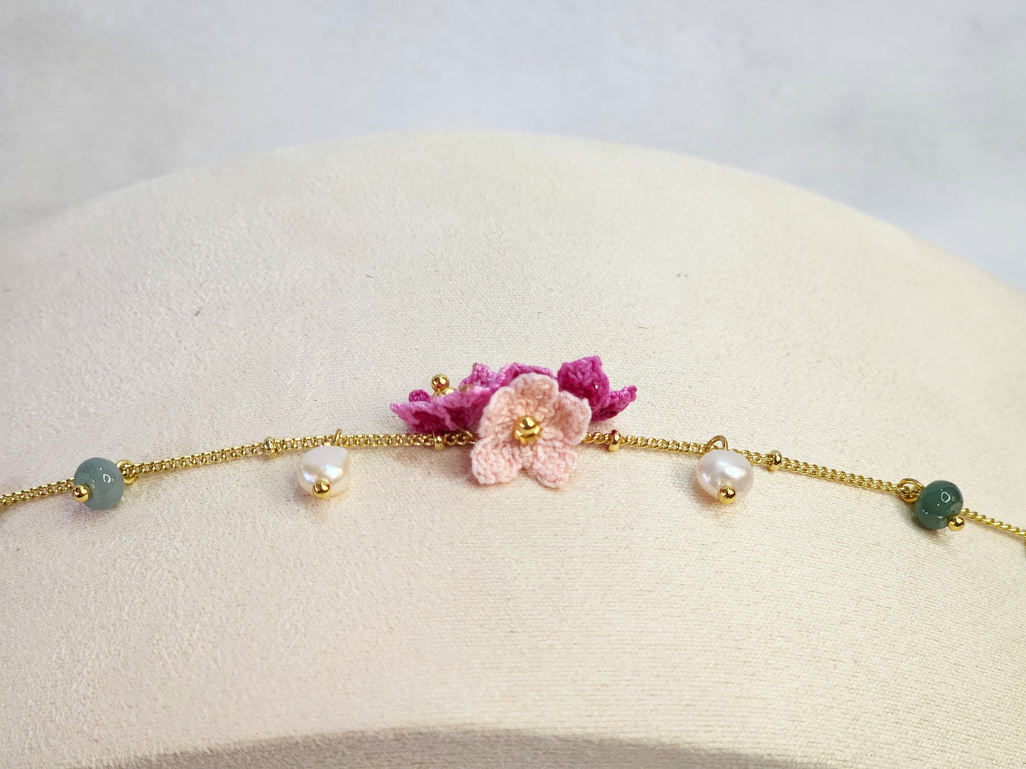 Natural Jadeite and Pearl bracelet with pink handcrafted micro-crochet peach blossoms on 18K gold-plated bracelet