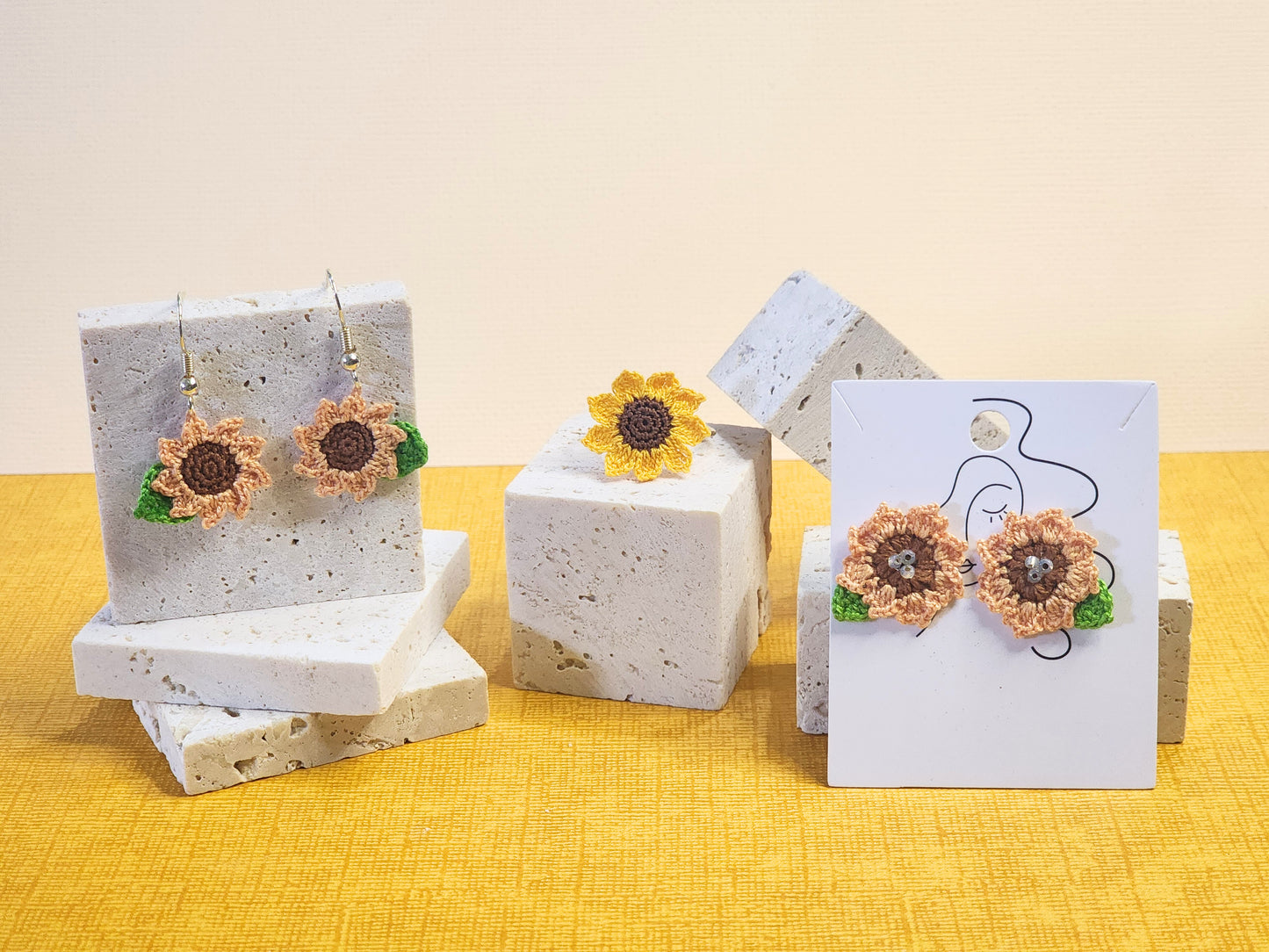A collection of Sunflower Micro-crochet Earrings & ring