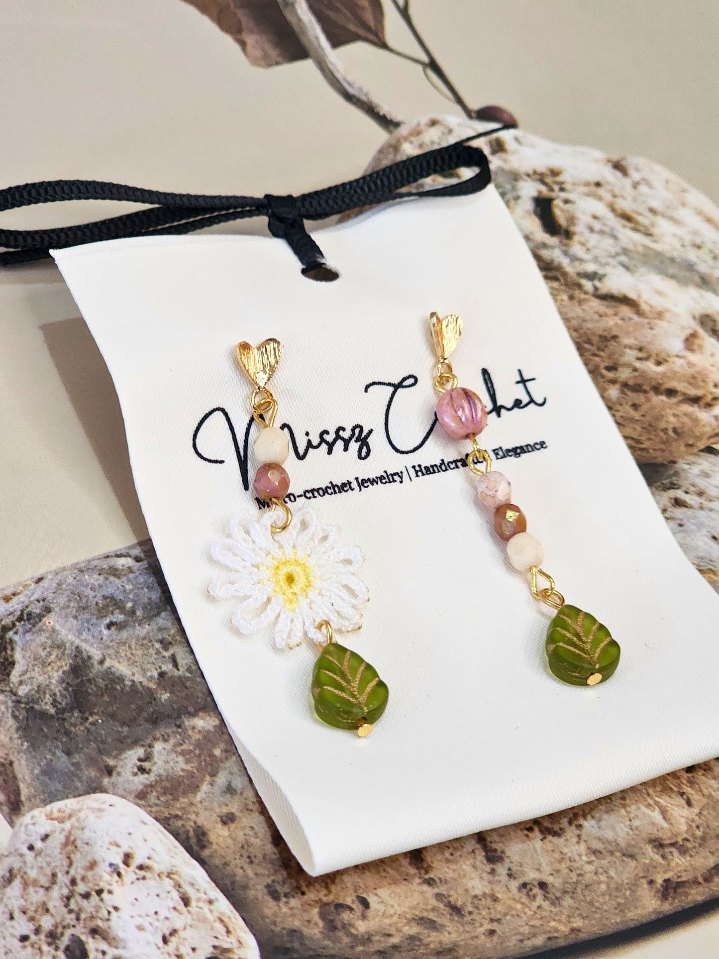Handcrafted daisy asymmetrical earrings with vintage glass beads & 18K gold-plated ear hooks.