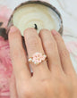 Natural 4-5mm Baroque pearls flank a handcrafted micro-crochet pink Sakura, on an 18K gold-plated ring.