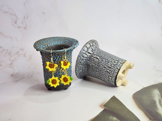 Handcrafted micro‑crochet Sunflowers Dangle Earrings. Adorned with Miyuki waterdrop glass beads from Japan and set on 14K gold-plated hooks.