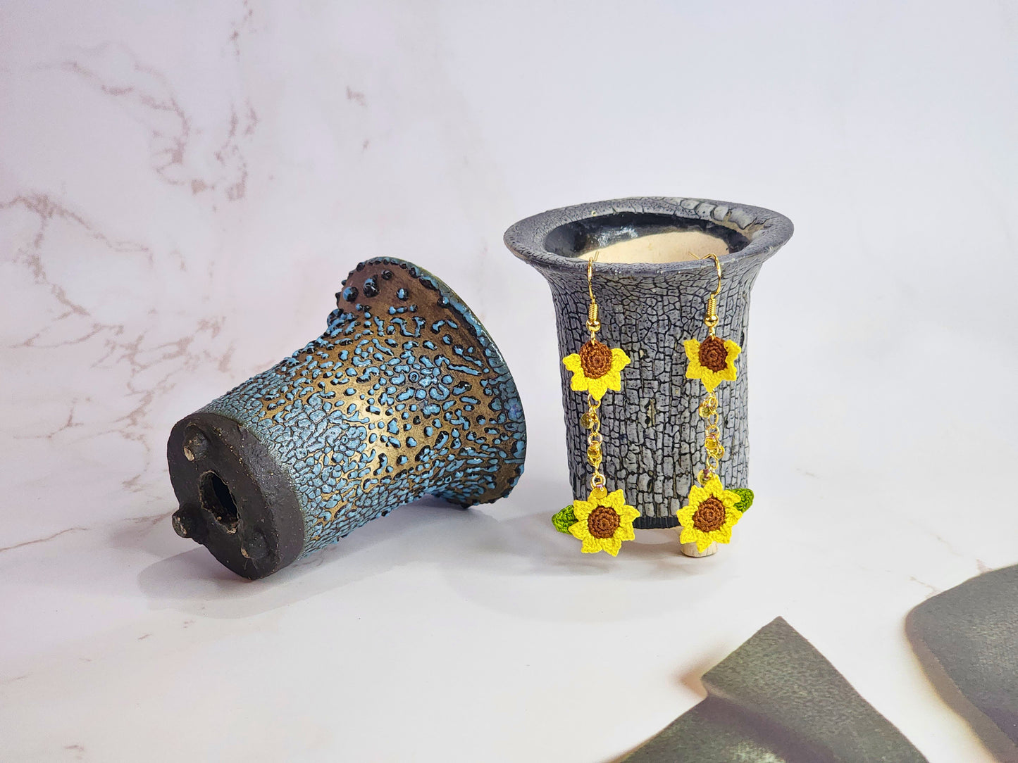 Handcrafted micro-crochet duo sunflowers adorned with a cascade of Miyuki waterdrop glass beads. 18K gold-plated hooks.