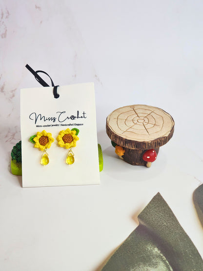 Handcrafted micro-crochet sunflower with Miyuki waterdrop glass beads. 18K gold-plated studs 