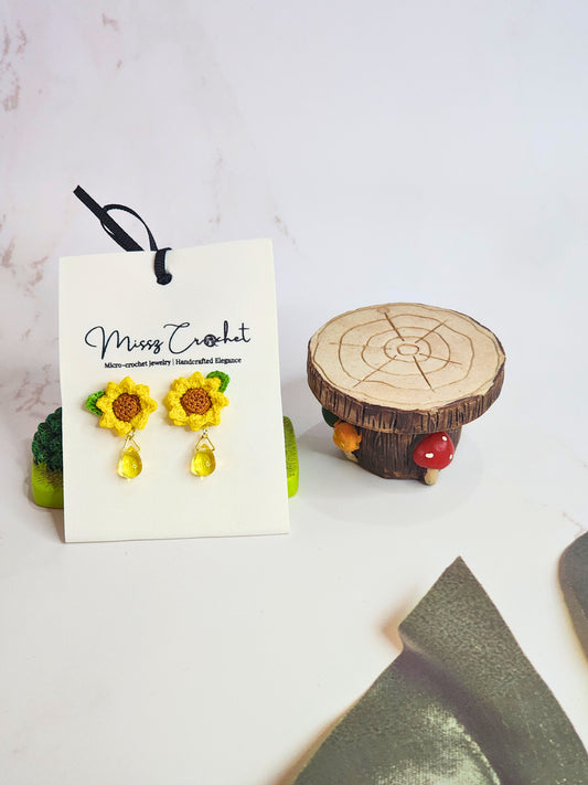 Handcrafted micro-crochet sunflower with Miyuki waterdrop glass beads. 18K gold-plated studs 