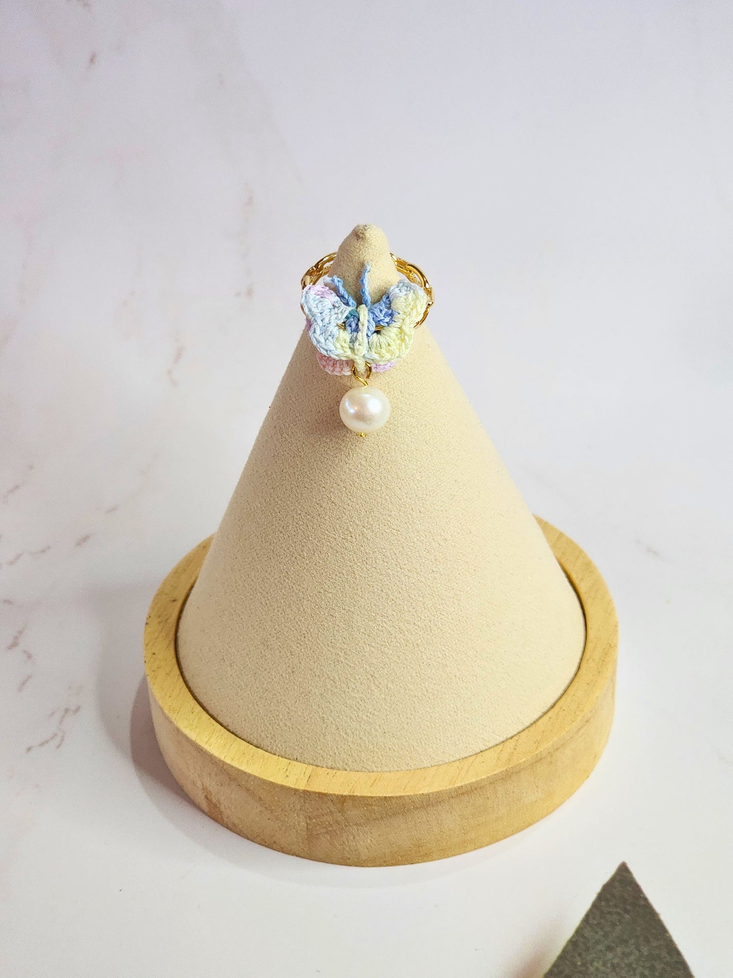 Handcrafted micro-crochet ombre Butterfly Ring with 8-9mm nearly round freshwater pearl. On 14K gold-plated ring.
