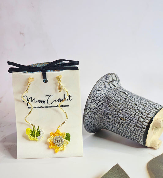 Unique handcrafted sunflower & butterfly twirl earrings on 18K gold-plated findings & heart studs.
