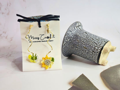 Unique handcrafted sunflower & butterfly twirl earrings on 18K gold-plated findings & heart studs.