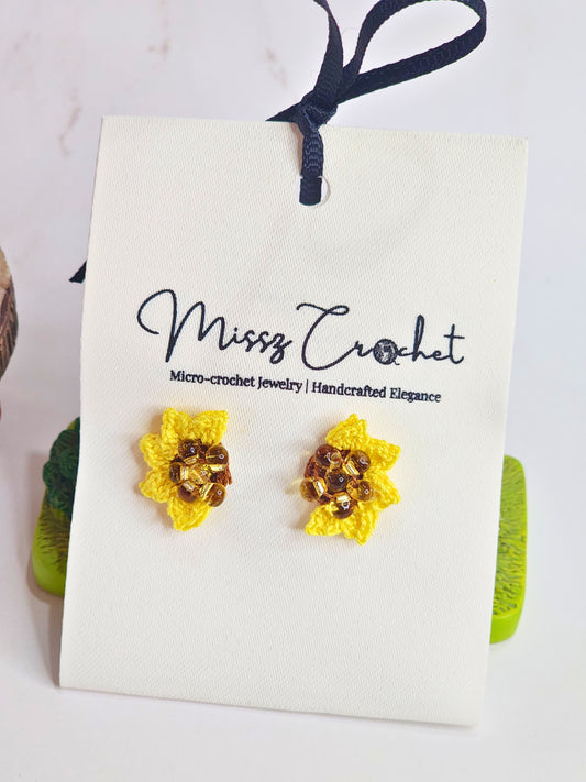 Handcrafted micro-crochet half sunflower earrings with Miyuki waterdrop glass beads. On 18K gold-plated studs.  
