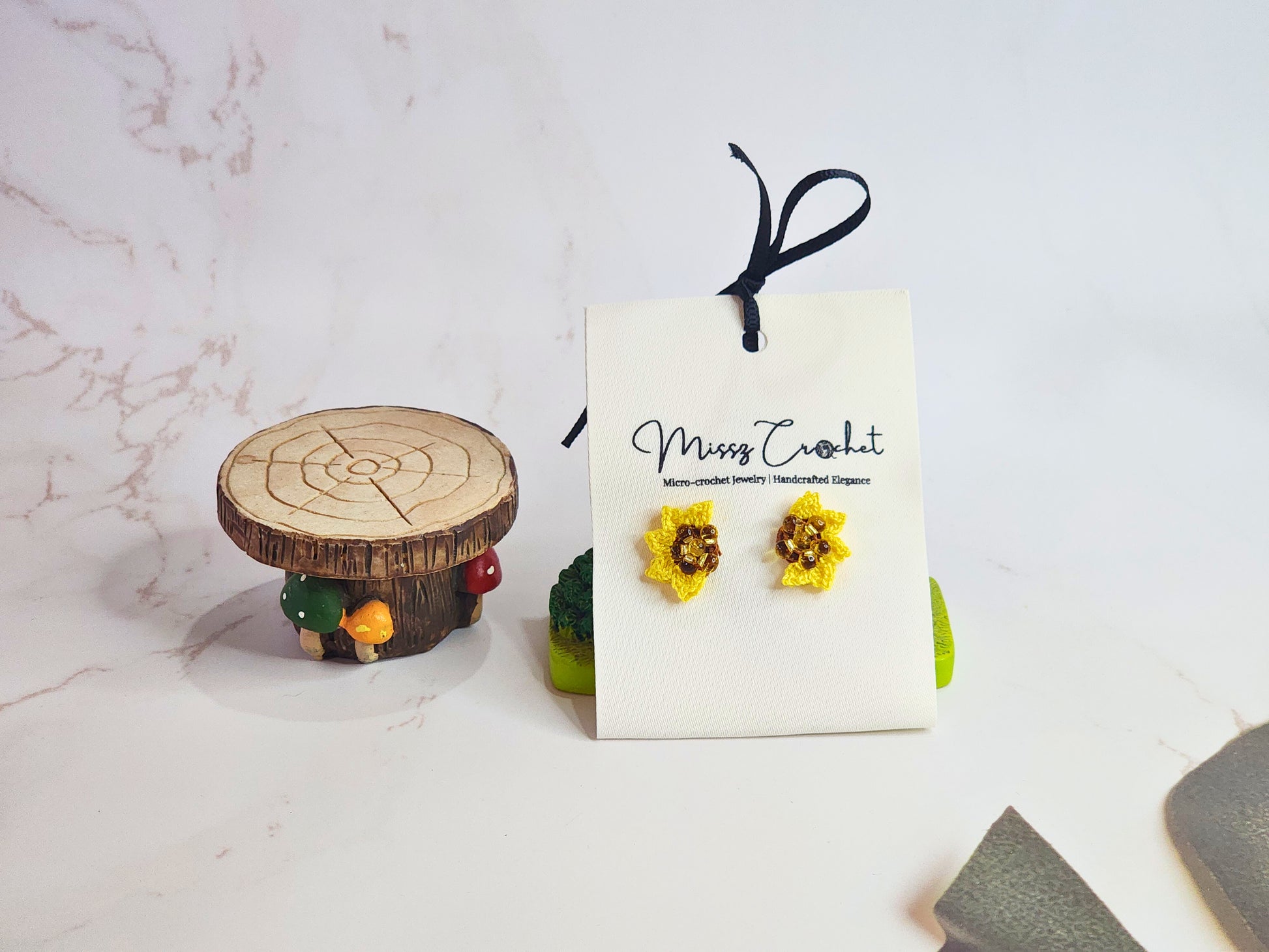 Handcrafted micro-crochet half sunflower earrings with Miyuki waterdrop glass beads. On 18K gold-plated studs. 
