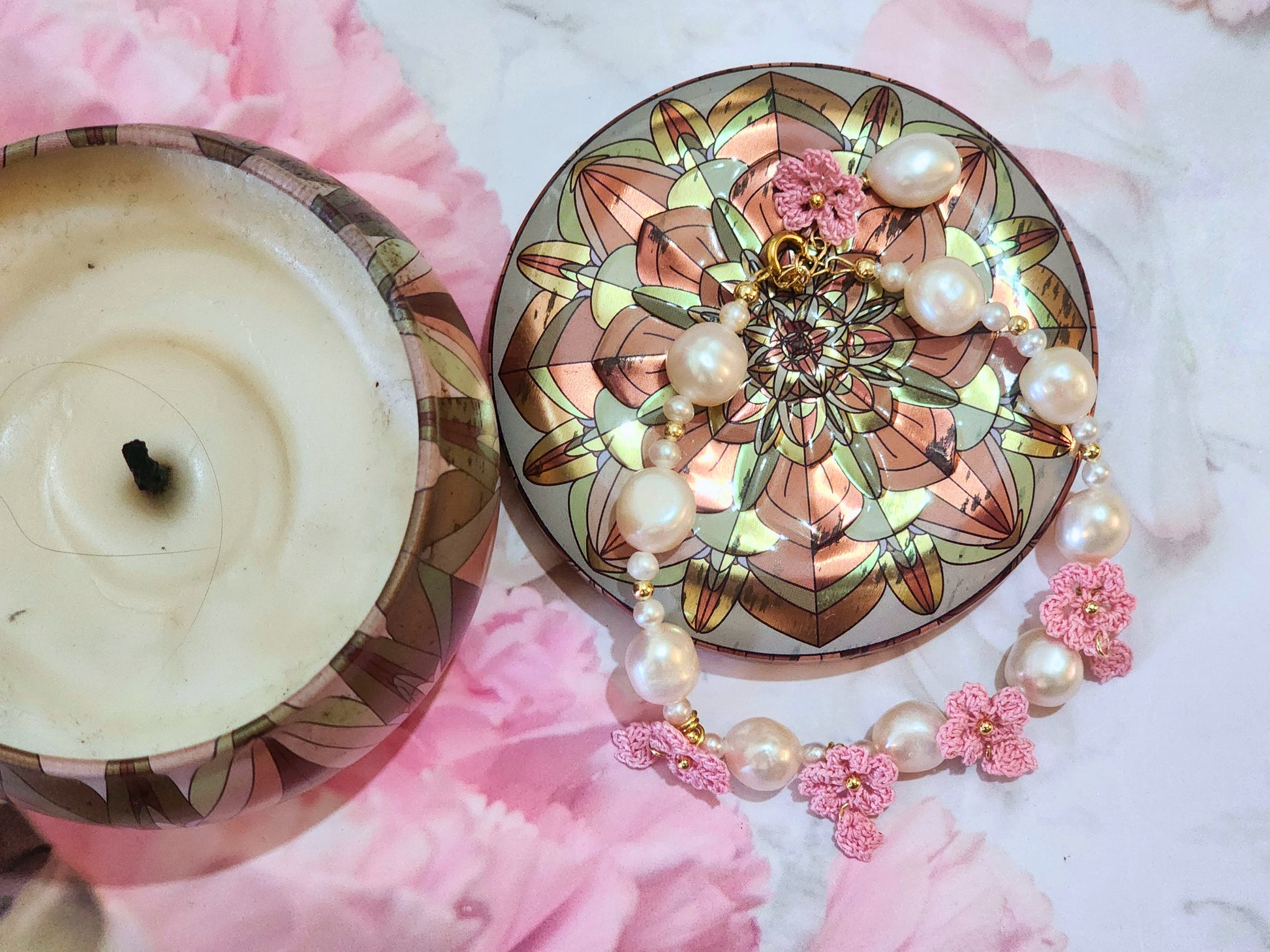 Natural 8-9mm Baroque Pearls with pink micro-crochet Sakura blossoms. Set with 18K gold-plated extension chain.