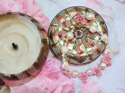 Natural 8-9mm Baroque Pearls with pink micro-crochet Sakura blossoms. Set with 18K gold-plated extension chain.