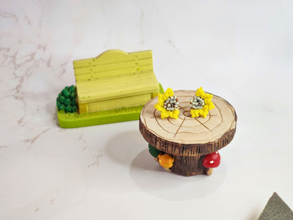 Handcrafted micro-crochet half sunflower with Czech glass beads at its heart. 18K gold-plated studs. 