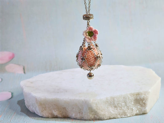 Dreamcatcher necklace with handcrafted micro-crochet pink 'pearl' & apple blossom. S925 sweater chain with cubic zirconia.