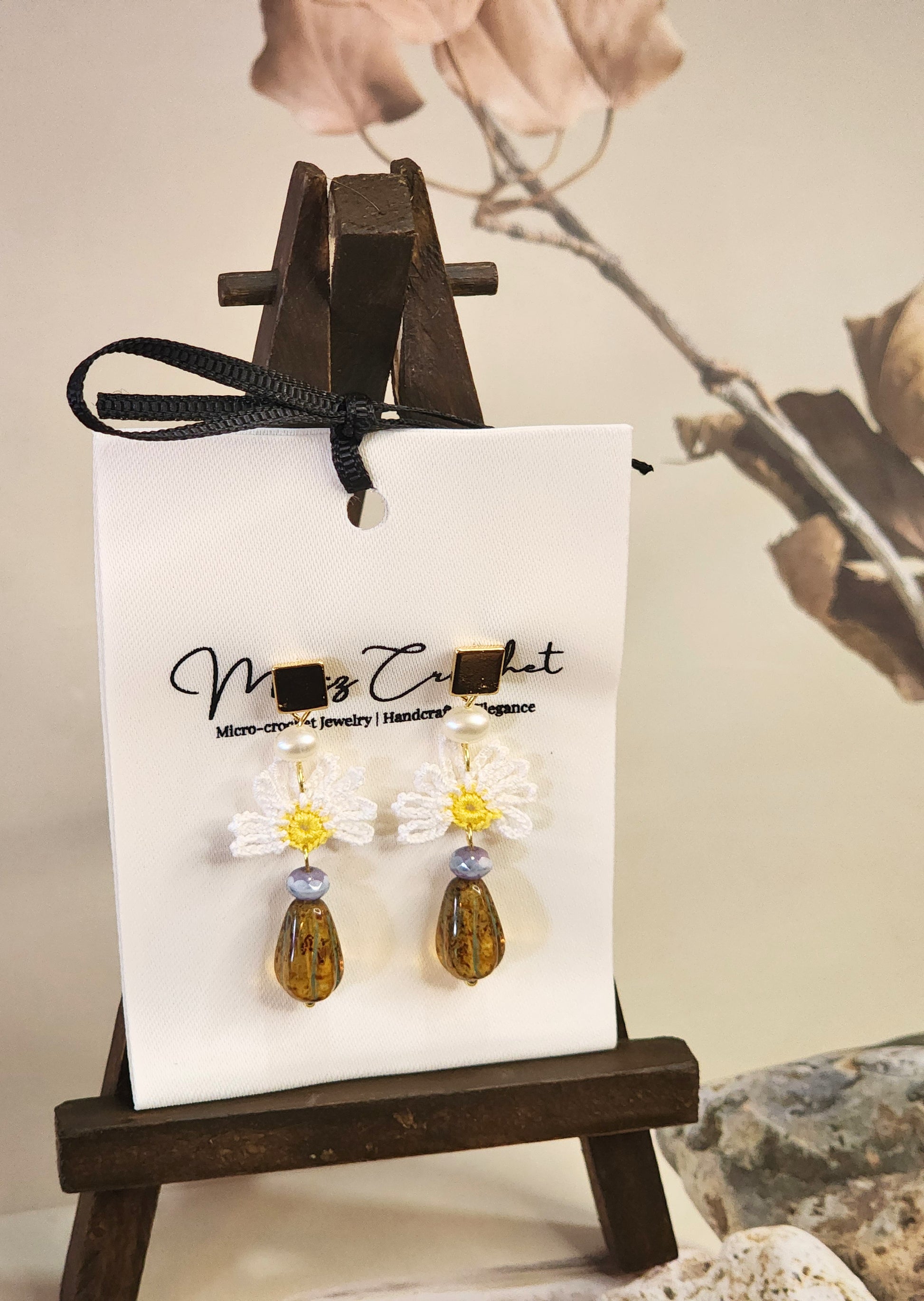 Handcrafted micro-crochet daisies earrings with freshwater pearls & vintage Czech glass beads. Styled with 18K gold-plated findings & studs 