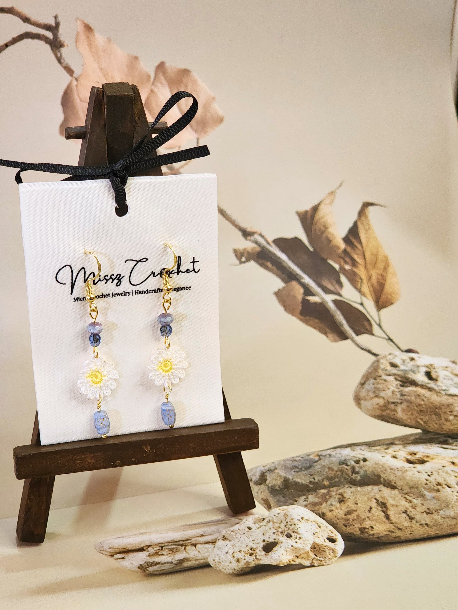 Handcrafted micro-crochet daisies paired with vintage Czech glass beads and 18K gold-plated findings & hooks 
