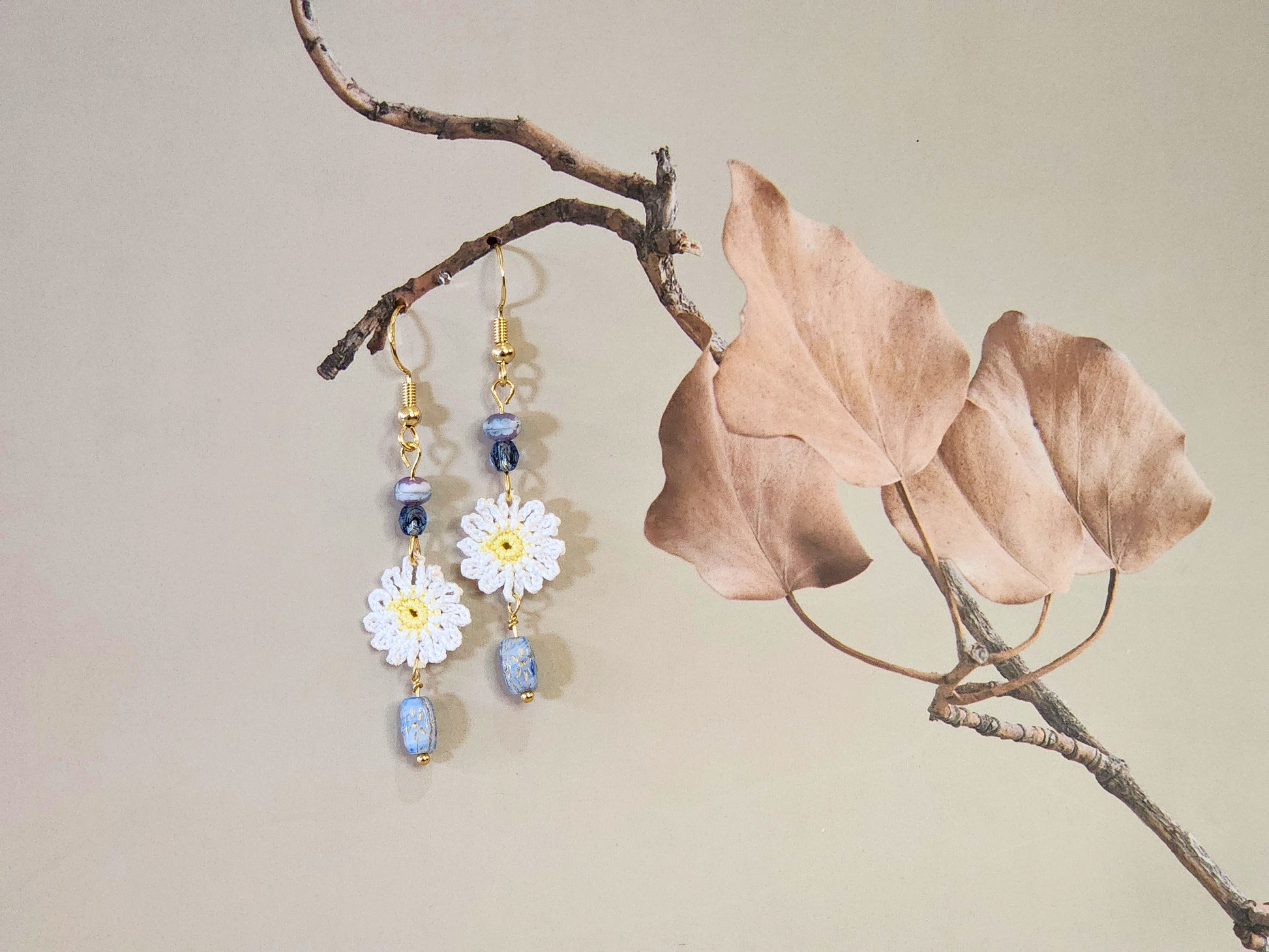 Handcrafted micro-crochet daisies paired with vintage Czech glass beads and 18K gold-plated findings & hooks