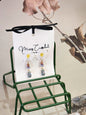 Handcrafted micro-crochet daisies with vintage Czech glass beads. Paired with 18K gold-plated findings & studs.