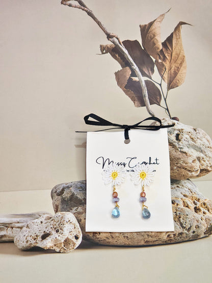 Handcrafted micro-crochet daisies with vintage Czech glass beads. Paired with 18K gold-plated findings & studs.