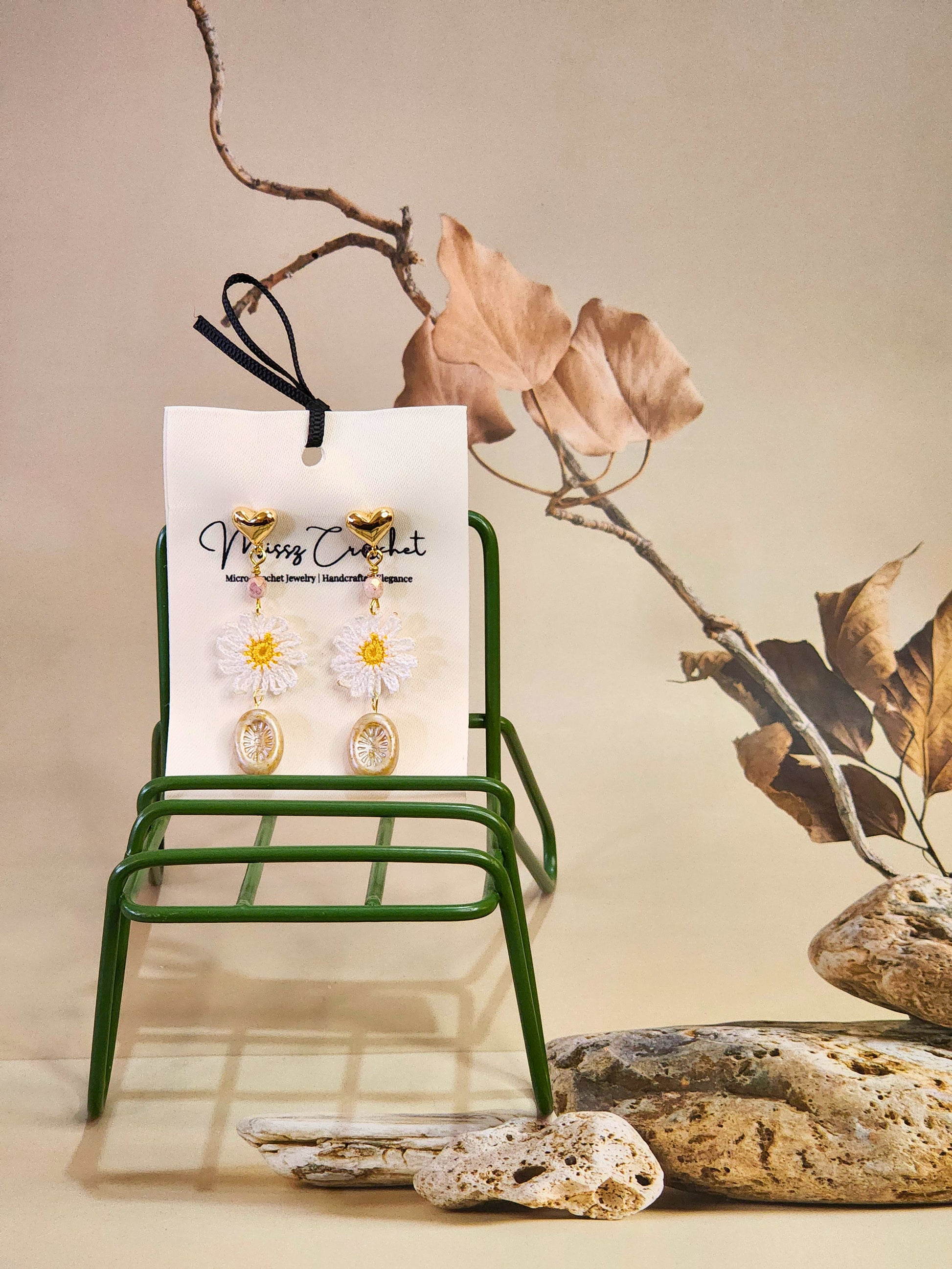 Handcrafted micro-crochet daisies accented with vintage Czech crystals and glass beads on 18K gold-plated hooks