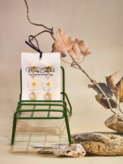 Handcrafted micro-crochet daisies accented with vintage Czech crystals and glass beads on 18K gold-plated hooks