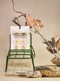 Handcrafted micro-crochet daisies accented with vintage Czech crystals and glass beads on 18K gold-plated hooks