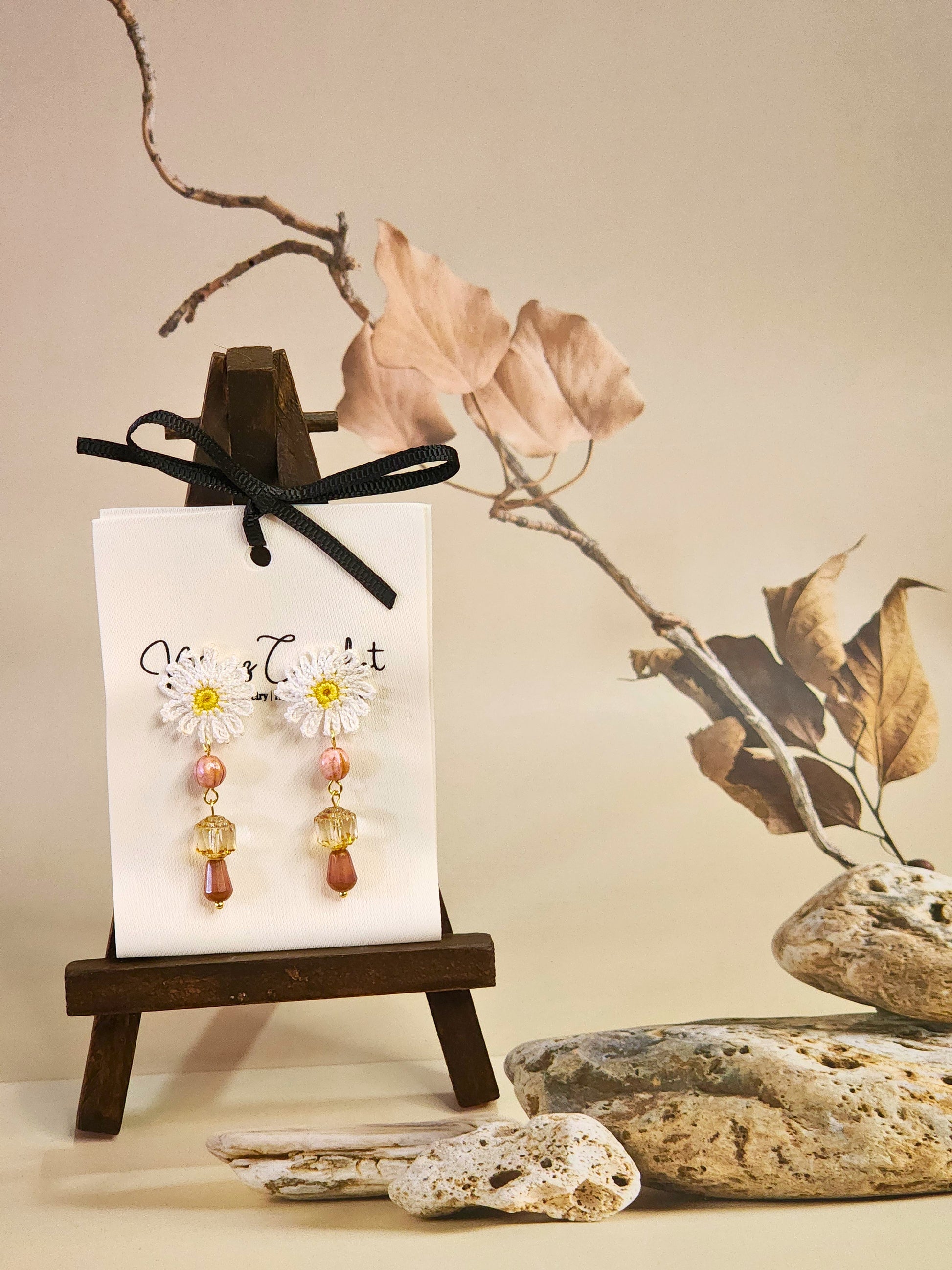 Handcrafted micro-crochet daisies accented with dazzling pink & brown Czech vintage glass beads & crystals. Styled with 18K gold-plated findings & studs