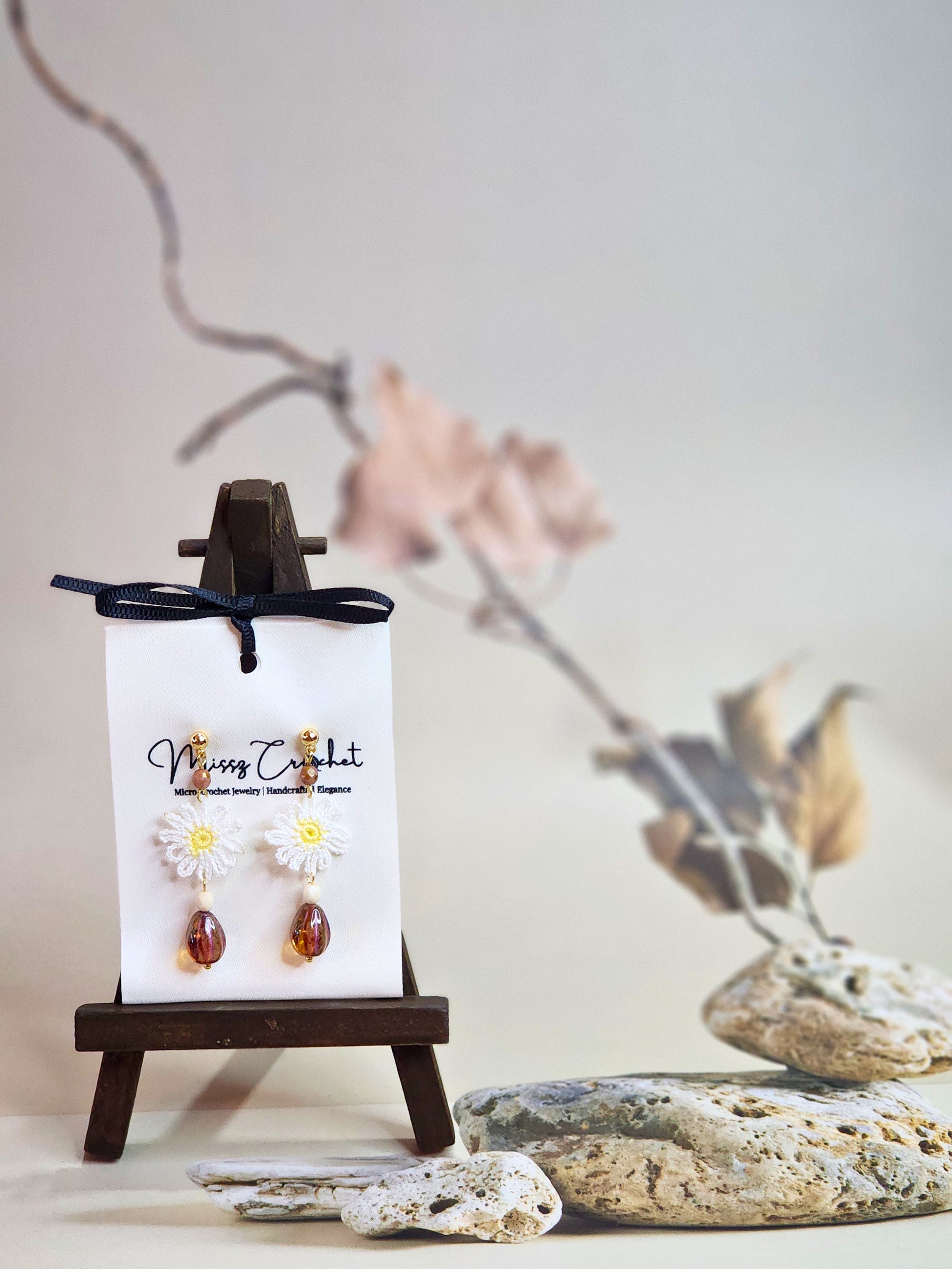 Handcrafted micro-crochet daisies accented by vintage Czech glass beads and crystals. Styled with 18K gold-plated findings & studs.