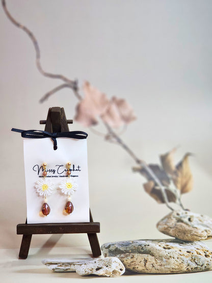 Handcrafted micro-crochet daisies accented by vintage Czech glass beads and crystals. Styled with 18K gold-plated findings & studs.
