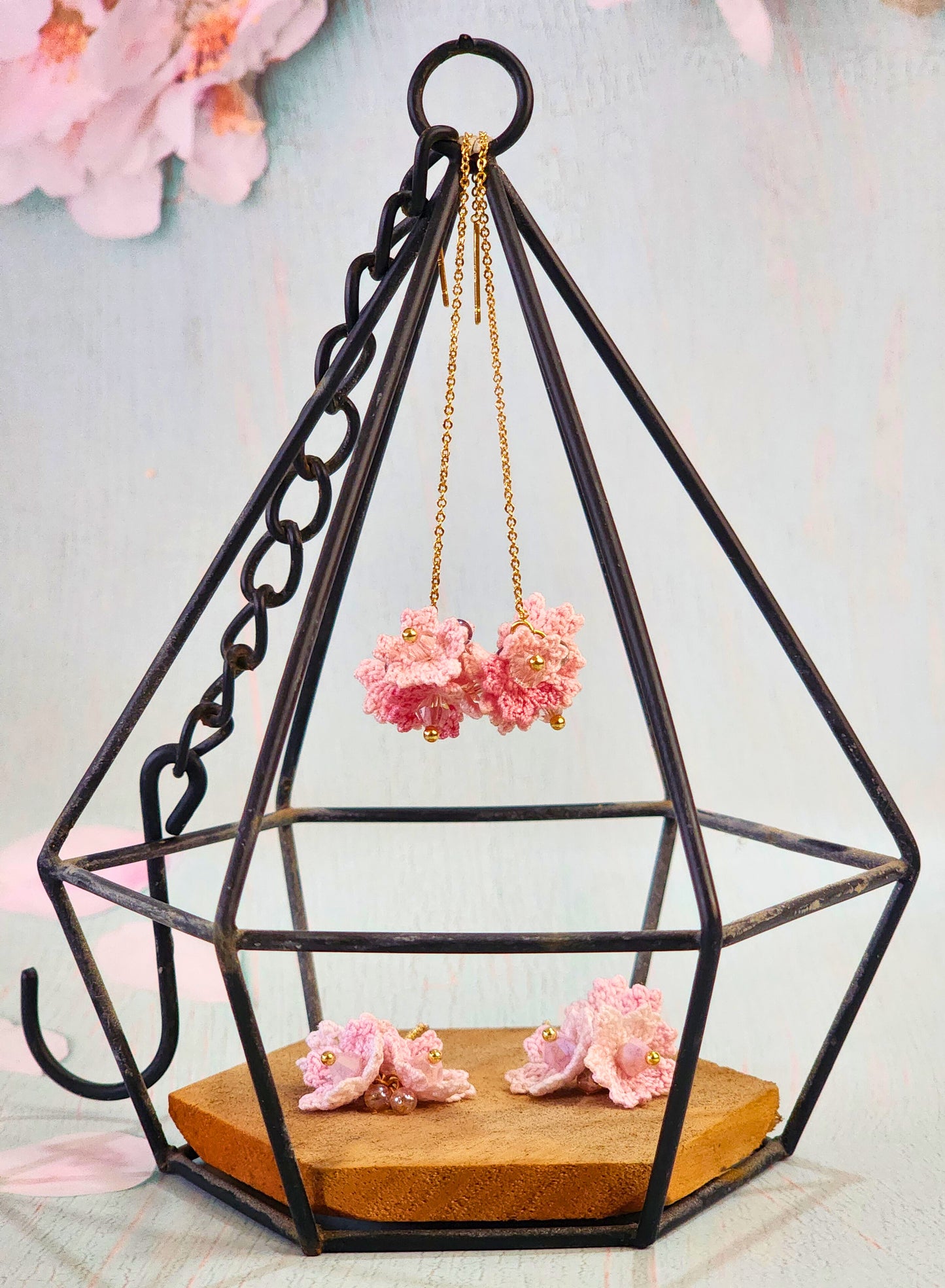 Two pairs of Sakura micro-crochet tassel earrings in varying shades of pink and adorned with premium crystals