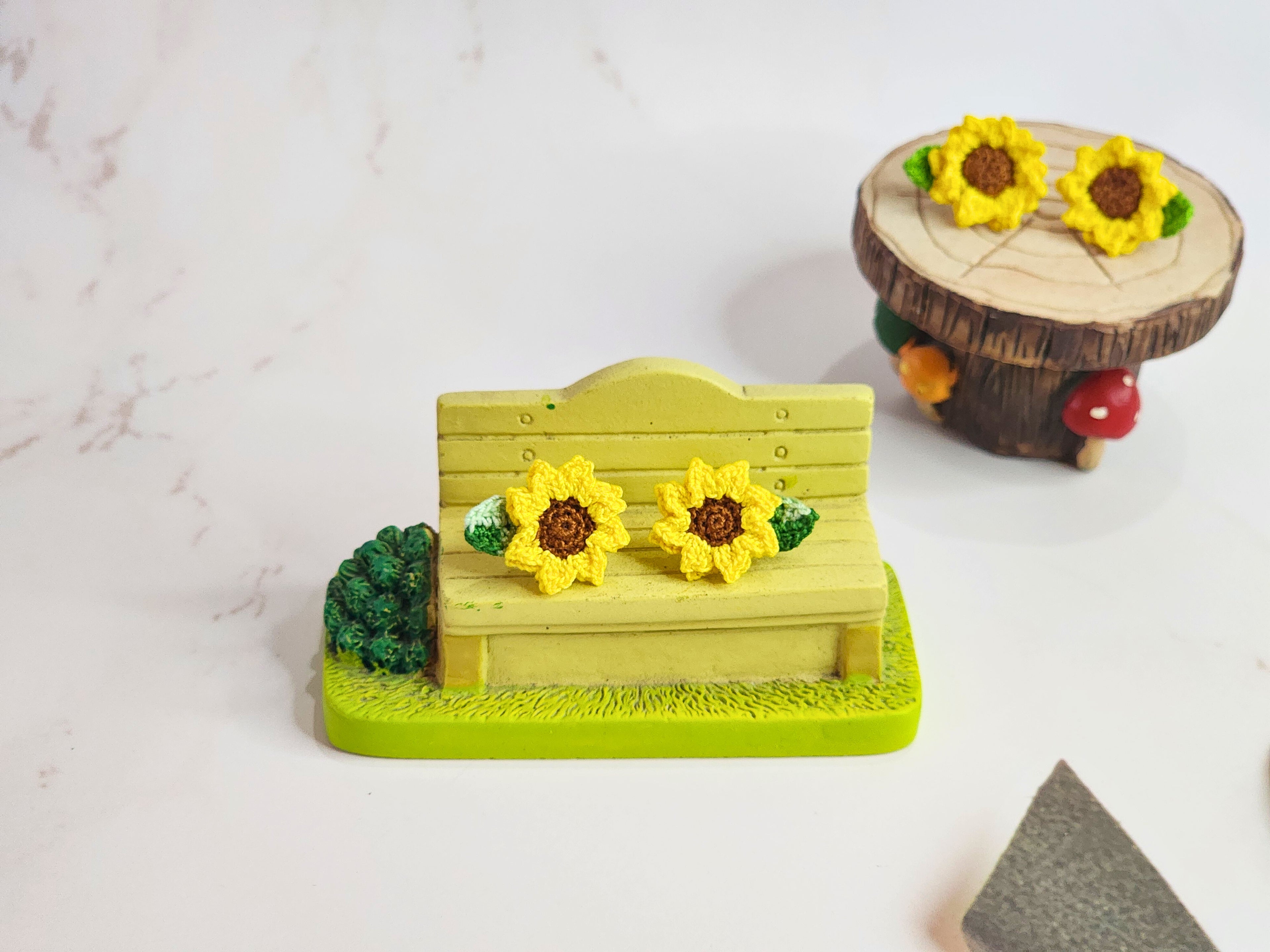 Handcrafted micro‑crochet Sunflower with Ombre Leaves earrings. Vibrant yellow matched with ombre green leaves. 18K gold-plated studs.