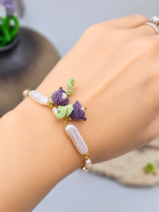 Handcrafted micro crochet Lily of the Valley blooms bracelet with beautifully satin-like >15mm white Pipa pearls and 4-5mm freshwater baroque pearls. 
