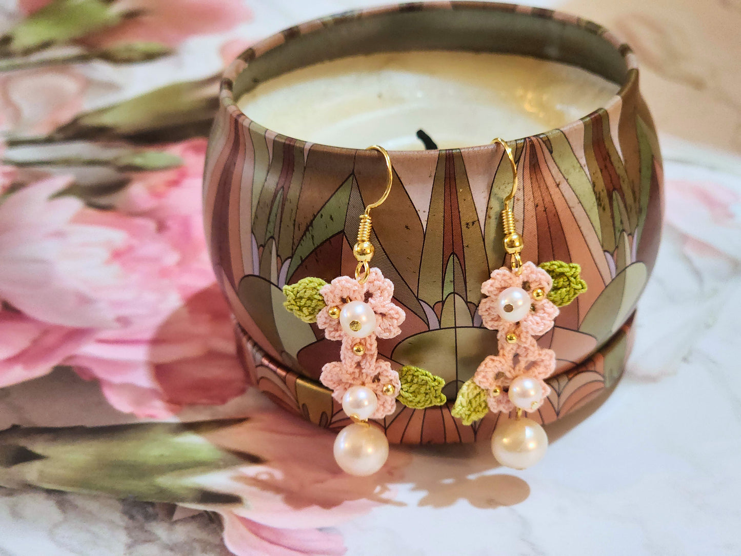 Handcrafted light pink sakura blossoms with natural freshwater pearls & 18K gold-plated hooks 