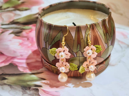 Handcrafted light pink sakura blossoms with natural freshwater pearls & 18K gold-plated hooks 
