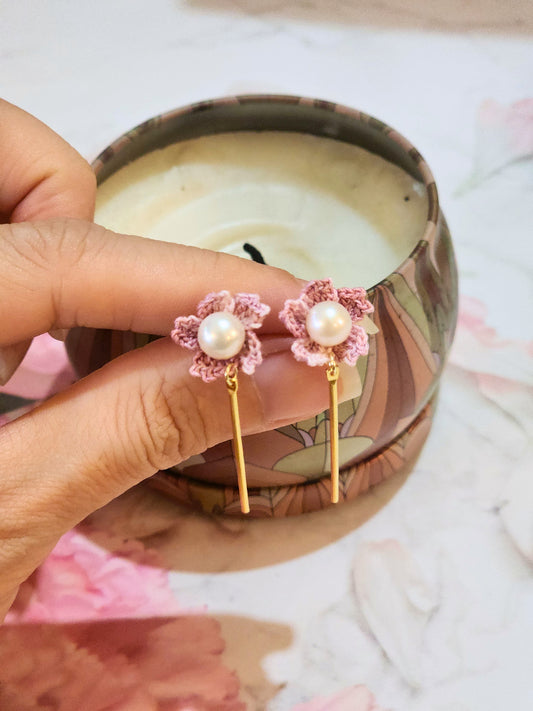 Handcrafted micro-crochet Sakura with pearls earrings. Adorned with 7-8mm nearly round, flawless natural freshwater pearls. 18K gold-plated studs.