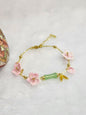 Natural Hetian Jade bracelet with handcrafted pink micro-crochet peach blossoms on 916 gold bracelet
