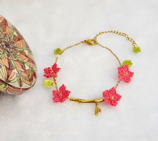 916 gold bamboo bracelet with handcrafted pink micro-crochet peach blossoms