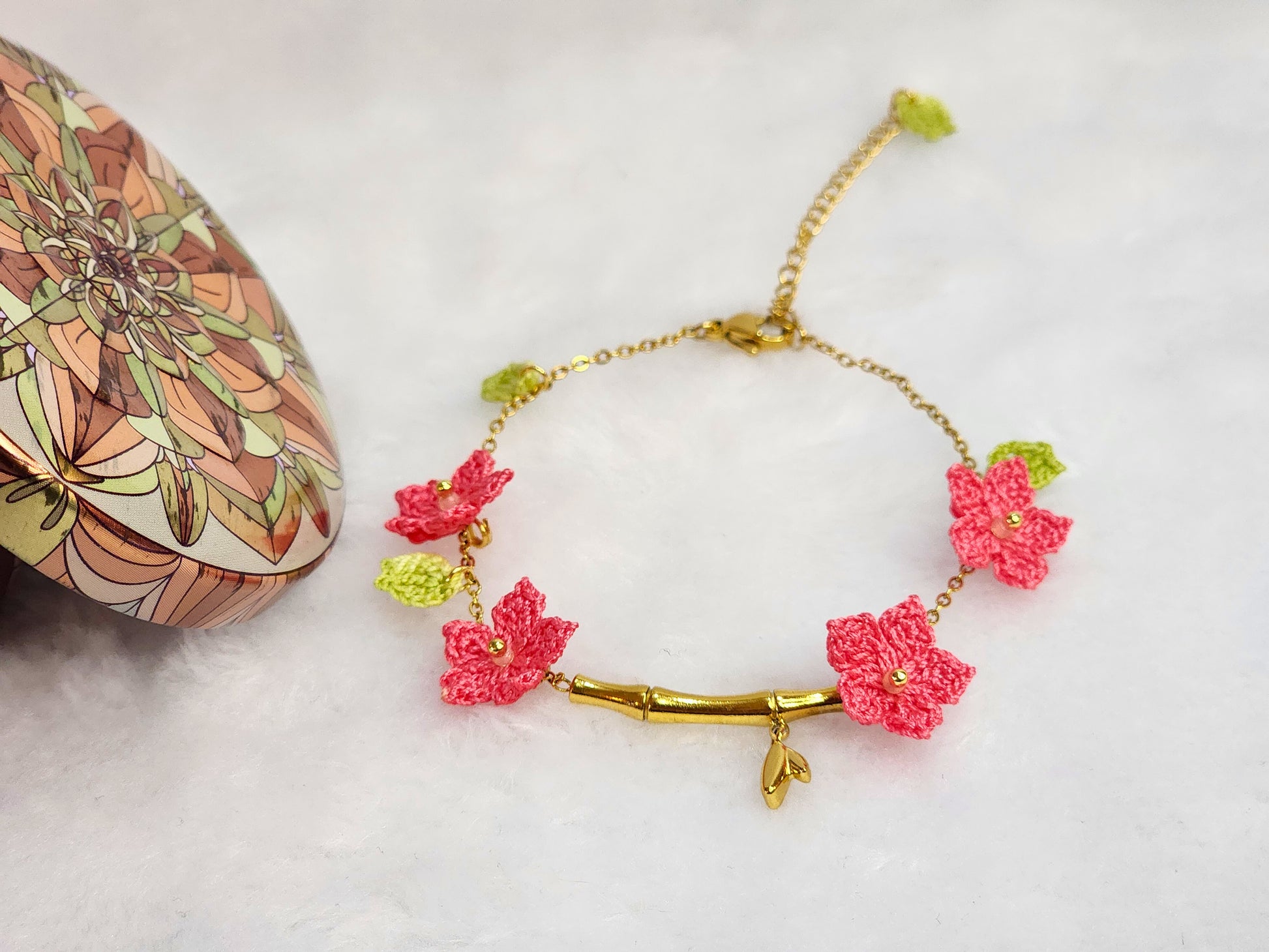 916 gold bamboo bracelet with handcrafted pink micro-crochet peach blossoms