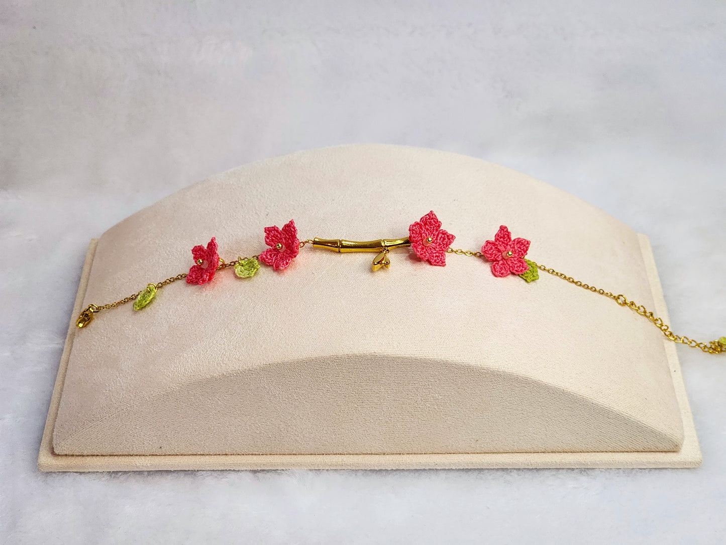 916 gold bamboo bracelet with handcrafted pink micro-crochet peach blossoms