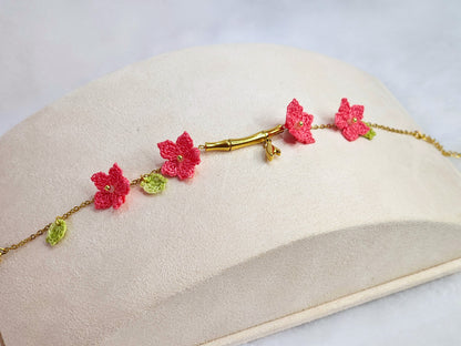 916 gold bamboo bracelet with handcrafted pink micro-crochet peach blossoms
