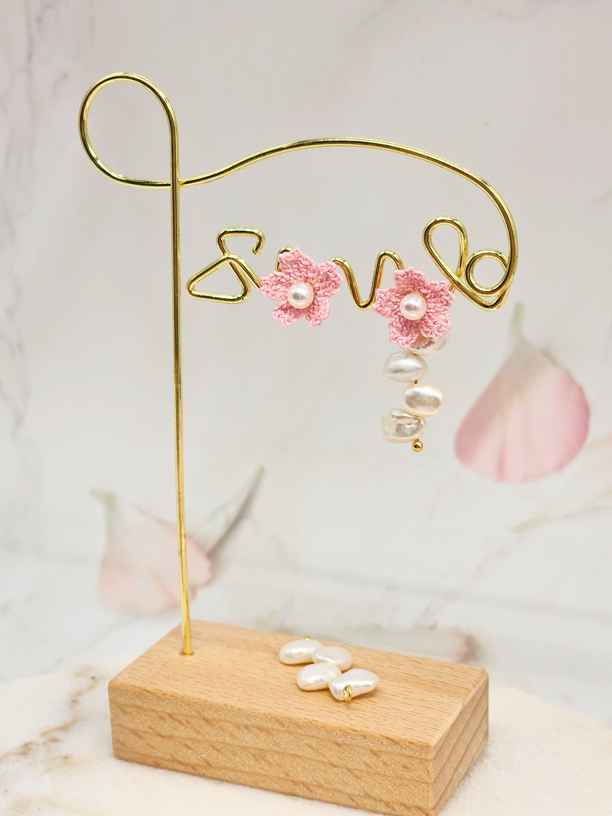 Micro crochet Sakura blossoms crowned with lustrous Akoya and Keshi pearls. Multi-wear earrings-one pair, four looks. Look 3: Sakura pearl studs.