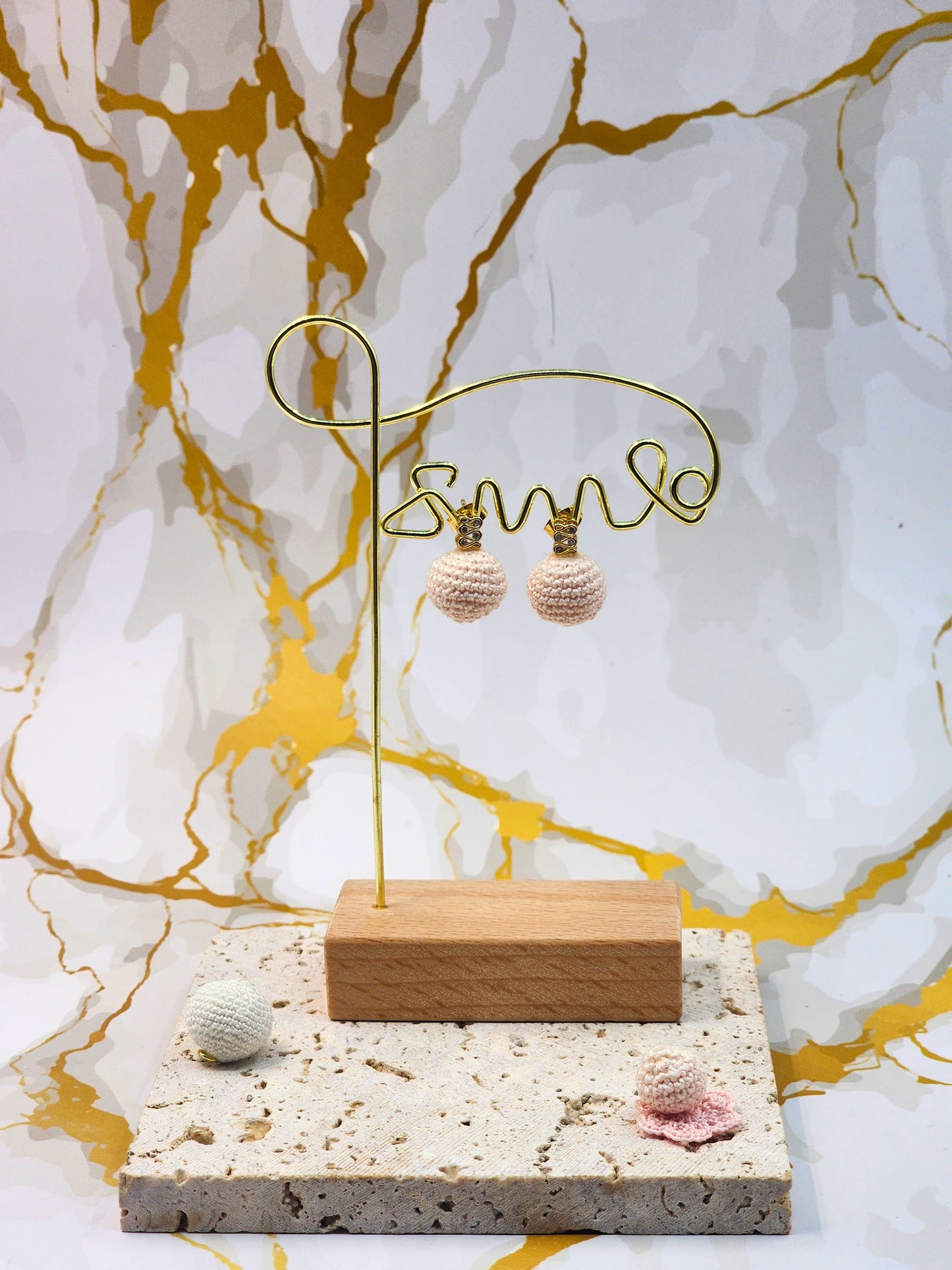Handcrafted light pink crochet pearls inspired by the luminous beauty of Japanese seawater pearls. Styled with 18K gold-plated cubic zirconia studs.