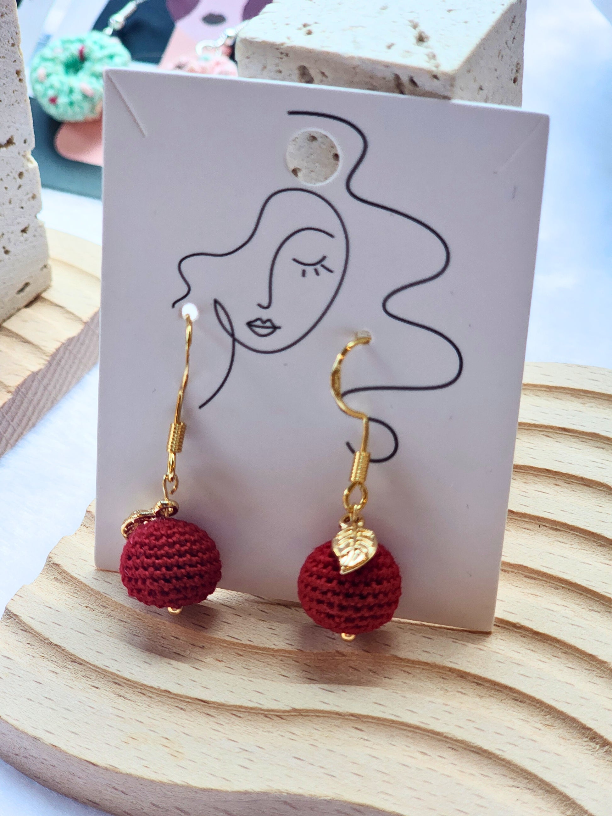 Pair of handcrafted micro-crochet earrings made with ultra-fine lace yarn and 18K gold-plated leaf and findings