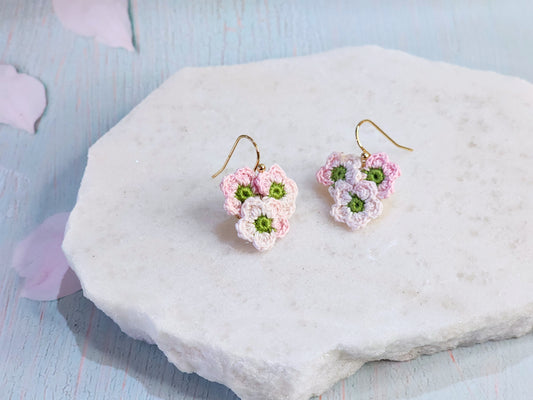 Handcrafted micro-crochet apple blossoms earrings on 18K gold-plated hooks. 