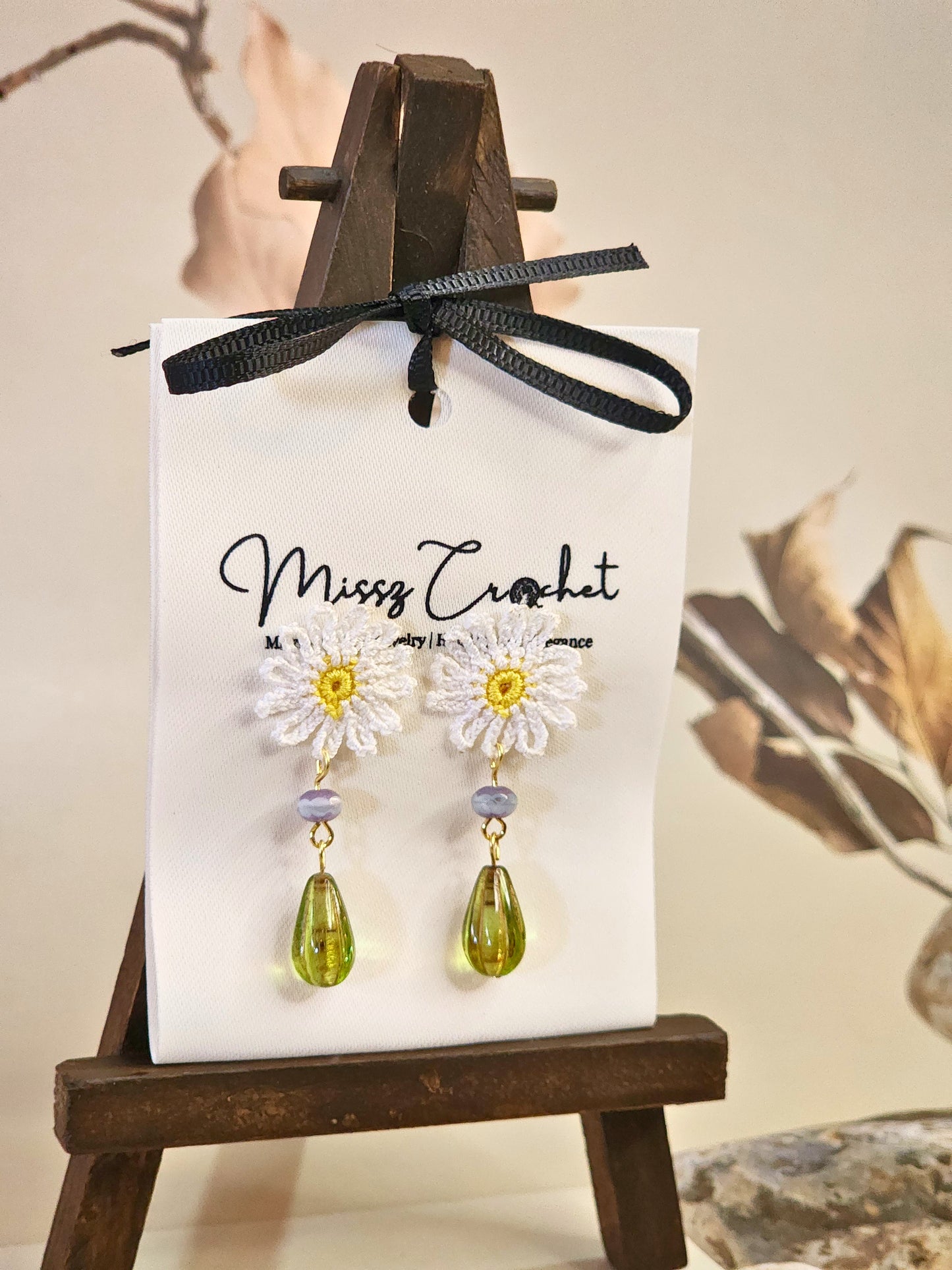 Handcrafted micro-crochet daisies paired with vintage Czech glass beads and styled with 18K gold-plated findings & studs