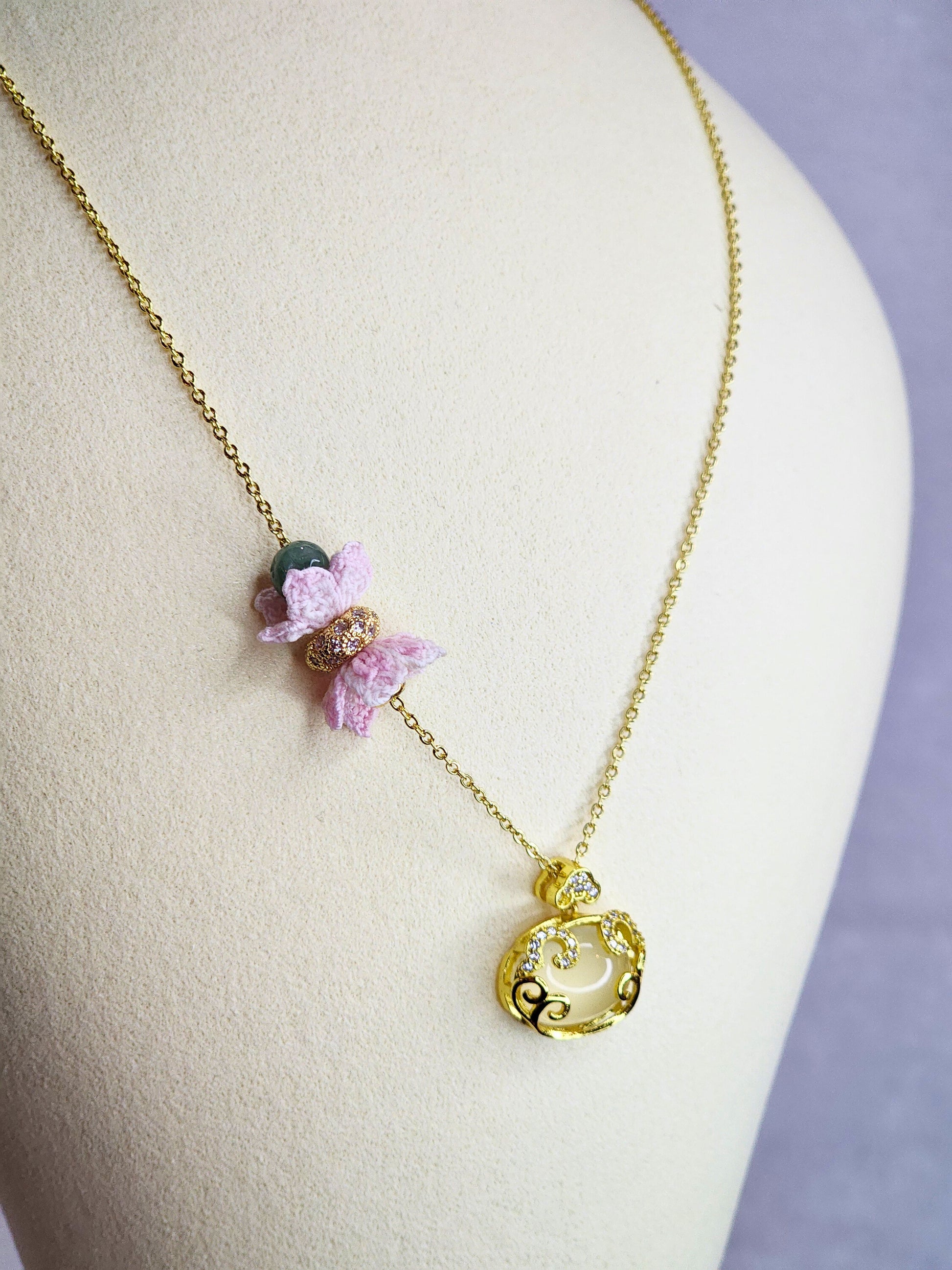 Natural Chalcedony Ruyi locket & Jadeite bead with pink micro-crochet blossoms on 18K gold-plated necklace