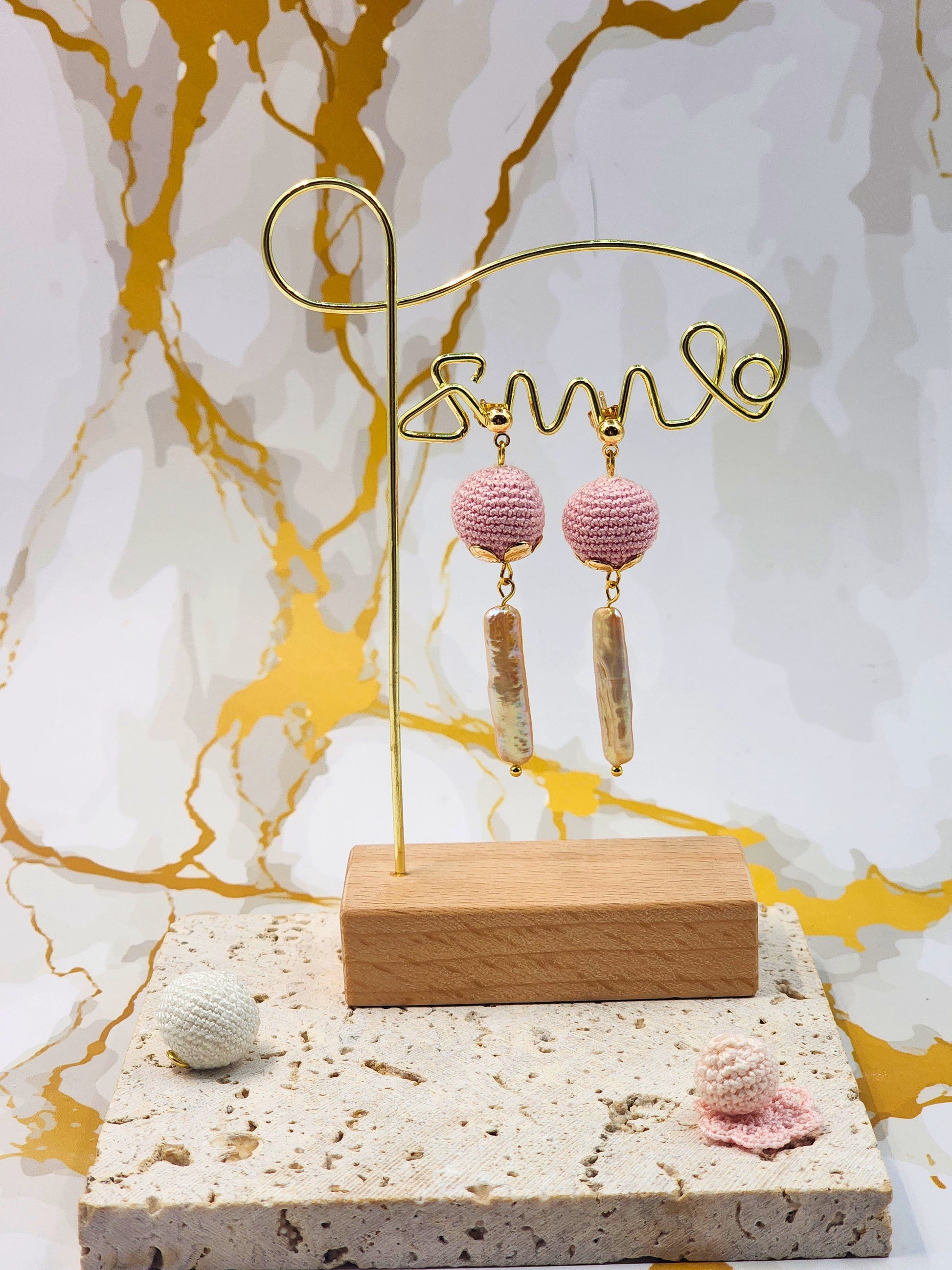 Handcrafted micro crochet pink pearls paired with unique, high lustre pink-gold Pipa pearls. Styled with 18K gold-plated studs.